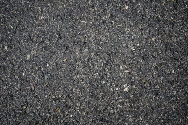 Kaba asfalt yol arka planının siyah dokusu. Asfalt yol dokusu asfalt, üst görünüm.                                