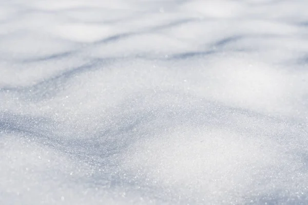 Nahaufnahme Von Schneebedecktem Boden Mit Unebener Oberfläche Und Schatten Von — Stockfoto