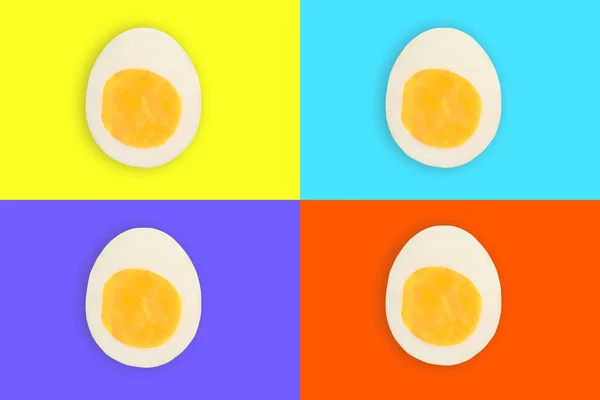 Four Cut Boiled Easter Eggs Yellow Purple Orange Blue Pop — Stock Photo, Image
