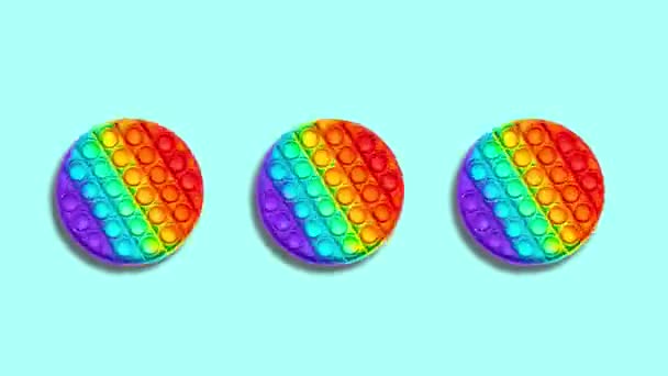 Stop Motion Animation Tres Juguetes Arco Iris Para Niños Antiestrés — Vídeo de stock