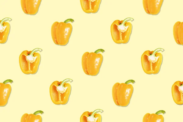Seamless Pattern Whole Halved Yellow Peppers Yellow Background — Zdjęcie stockowe