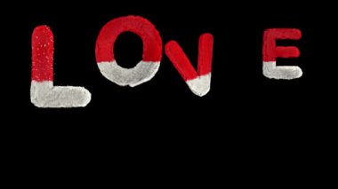 Bouncing Santa Hary text with alpha forming the word love