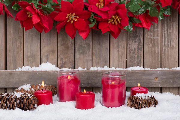 Candele nella neve — Foto Stock