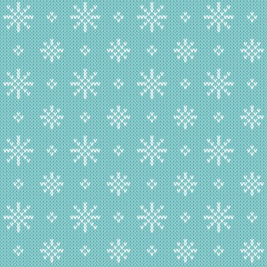 Noel süveteri kar taneleri pürüzsüz desenli. Mavi arka planda küçük beyaz kar taneleri ile örülmüş kış deseni.