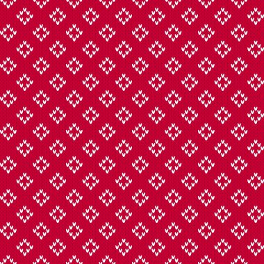 Kırmızı ve beyaz Noel süveteri Fair Isle tarzı eşkenar dörtgen desenli. Kış elması desenli örgü. Kırmızı arka planda beyaz eşkenar dörtgenler. Klasik nötr kış örgü dokusu arka planı.