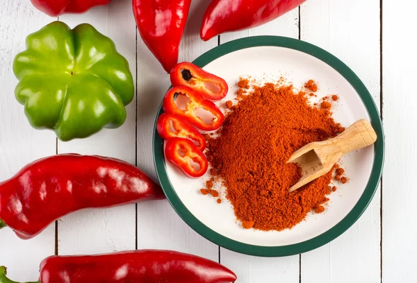 Colorful raw peppers on table - top view — Stock Photo, Image