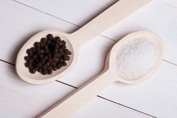 Rock salt and black pepper — Stock Photo, Image