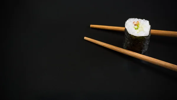 Sushi on black background — Stock Photo, Image