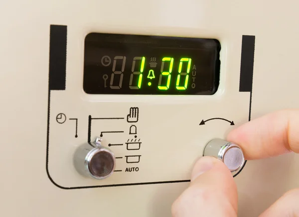 Setting a cooker timer. — Stock Photo, Image