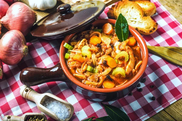 Tripe Florentine, typical Italian, Polish, French food. On a rus — Stock Image Tripe Florentine, typical Italian, Polish, French food. On a rus Royalty Free Stock Photos