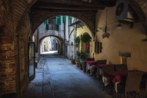 Tuscan restaurant in the corners of the medieval town of Montepu — Stock Photo, Image