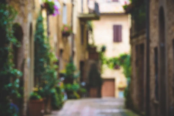 Calle borrosa en un pequeño pueblo mágico Pienza, Toscana . —  Fotos de Stock