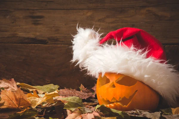 Halloween Pumpkin with Santa Claus hat — Stock Photo, Image