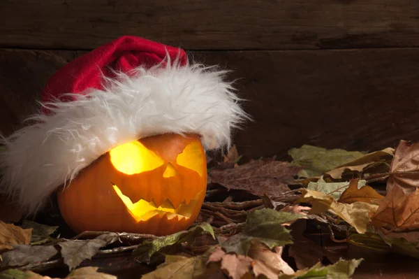 Halloween Pumpkin with Santa Claus hat — Stock Photo, Image