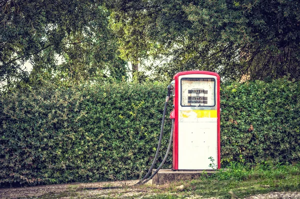 Old and abandoned fuel distributor in vintage style, — Stock Photo, Image