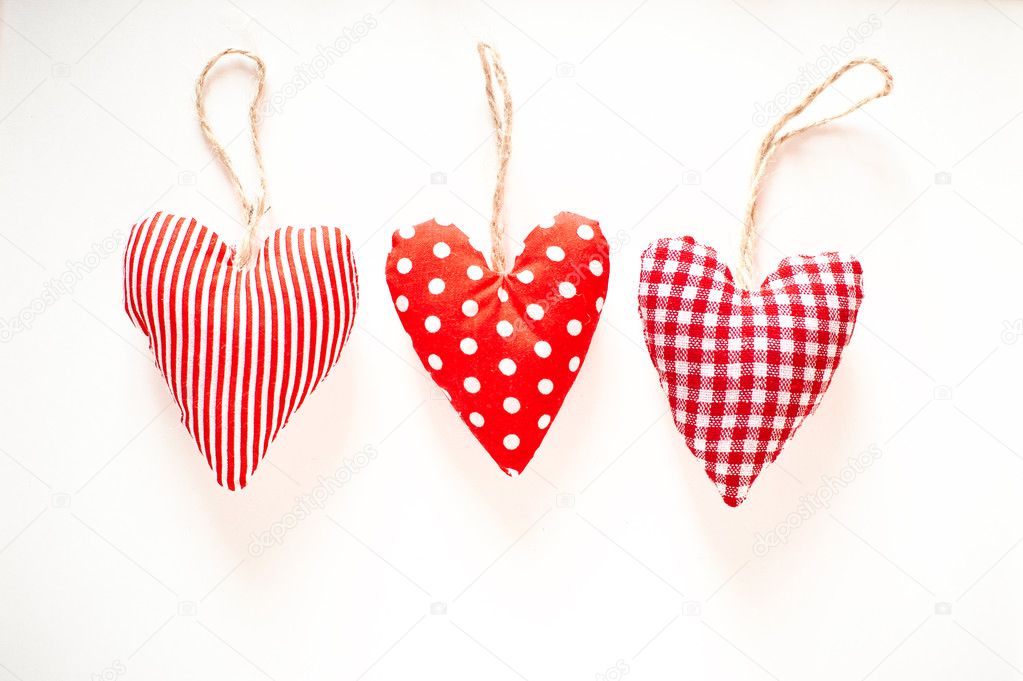 Red hearts on a white background for love on St. Valentine's Day