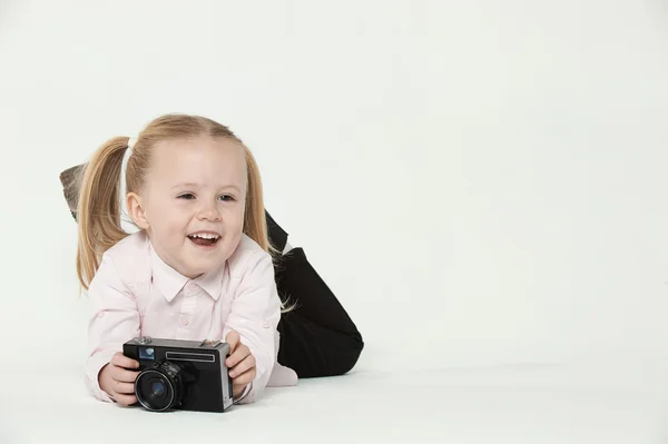 Smiling and having fun the photographer a beautiful blond girl o — Stock Photo, Image