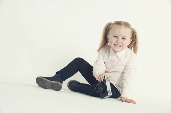 Smiling and having fun the photographer a beautiful blond girl o — Stock Photo, Image