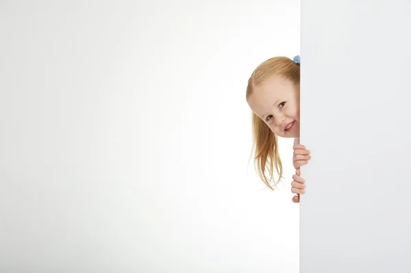 Beautiful little girl with white copy space on a white backgroun — Stock Photo, Image