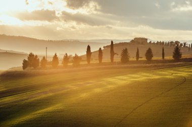 Wonderful sunset over the valley in Tuscany