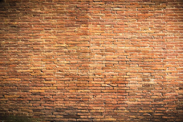 Fantástica pared de ladrillo de ladrillos de arcilla roja como fondo — Foto de Stock