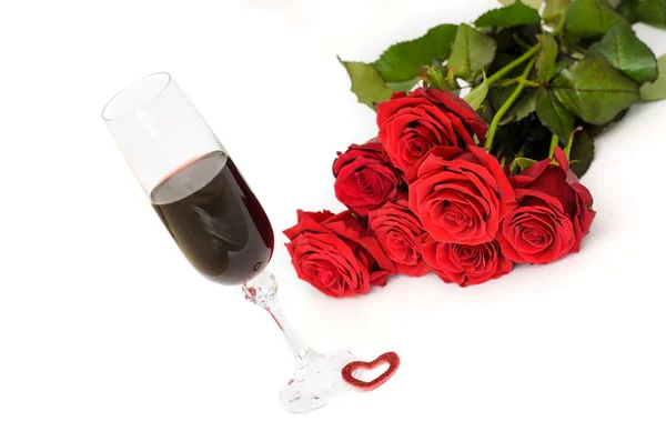 Ramo de rosas rojas con vino —  Fotos de Stock