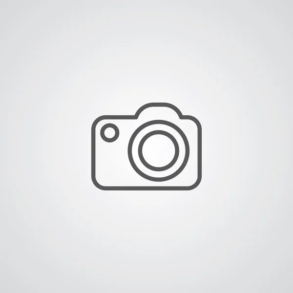 Símbolo del contorno de la cámara fotográfica, oscuro sobre fondo blanco, temp logotipo — Vector de stock