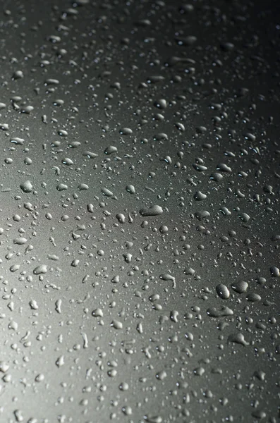 Wassertropfen auf metallischer Oberfläche — Stockfoto
