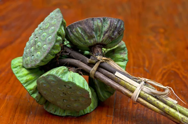 Lotus seeds green on a wooden plank closeup — Stock Photo, Image