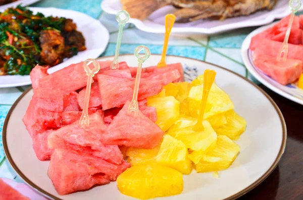 Pineapple, watermelon on dish — Stock Photo, Image