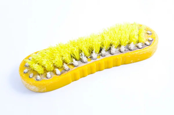 Vieille brosse de nettoyage sur fond blanc — Photo