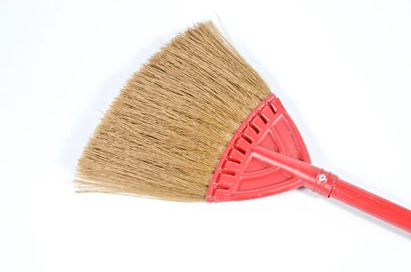 Red broom isolated on white background — Zdjęcie stockowe
