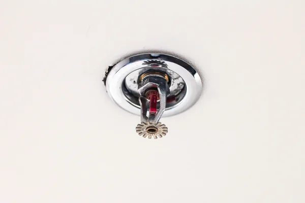 Fire sprinkler on the ceiling — Stock Photo, Image