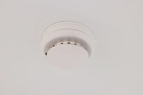 Smoke detector on a ceiling — Stock Photo, Image