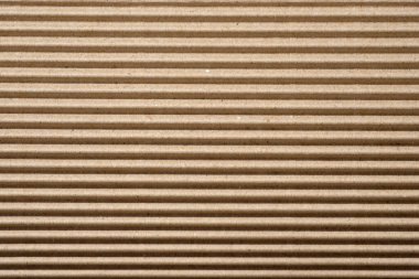 Oluklu tahta arka planı kapatın. Karton paketleme malzemesi dokusu. Paket olarak kullanmak için karton. 