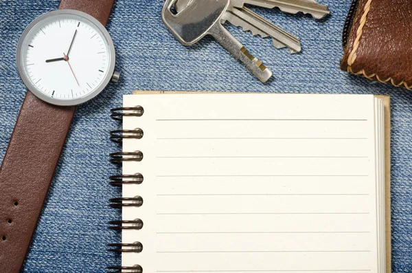 Notebook  blank pages with watch and key Stock Photo