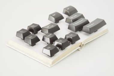 Kitap formadaki bilgisayar anahtarları