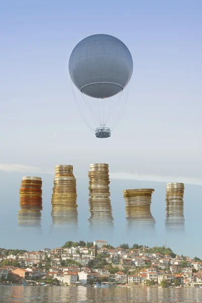Gas Balloon, Stakes of Coins and Townscape — Stock Photo, Image