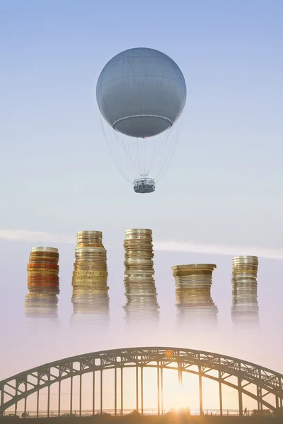 Gas Balloon, Stakes of Coins and Bridge — Stock Photo, Image