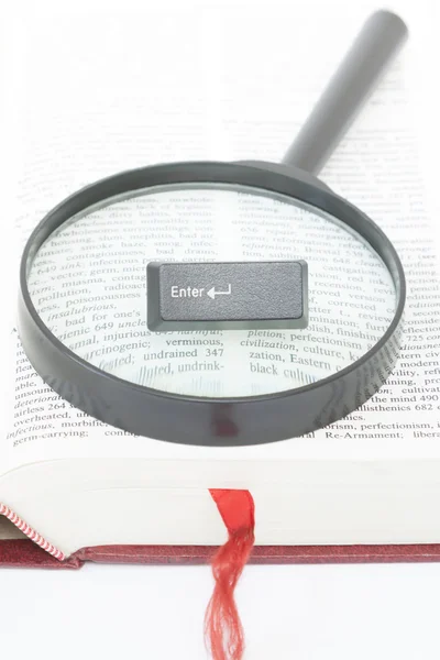 Enter Computer Key on a magnifying glass — Stock Photo, Image