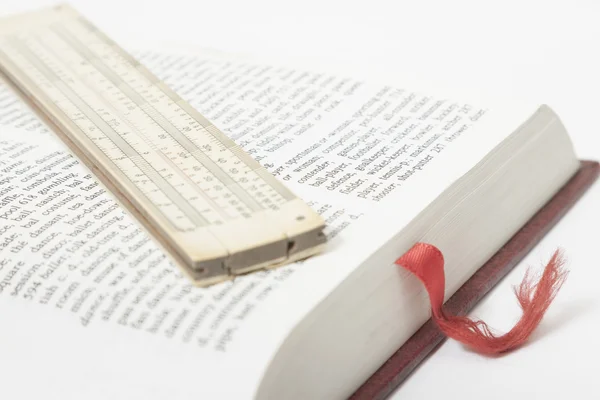 Vintage Slide Rule on a Book Page — Stock Photo, Image