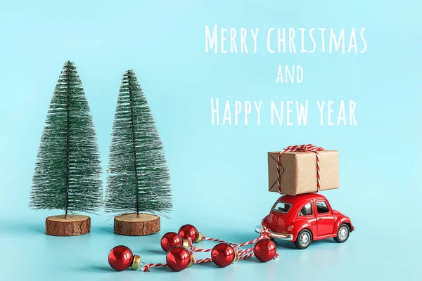 Small Red Car Carries Gift Box Christmas Tree Copy Space — Stock Photo, Image