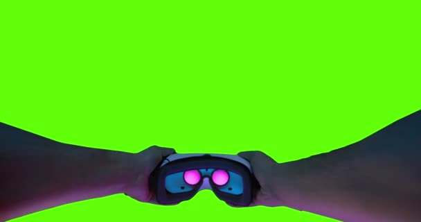POV Green Screen Mans Hands Putting Virtual Reality Headset Innovation Exploring Reality Immersive Technologies XR VR AR MR Hybrid Reality New Technologies Future Slow Motion 8k RED — Stock Video