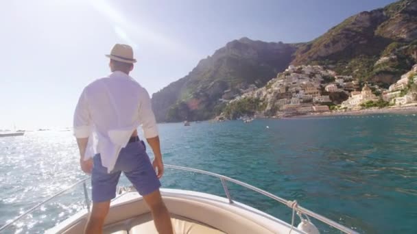 Male Model Raising Arms In The Front Of Boat Success Holiday In Europe Fearlessness Slow Motion Shot Red Epic 8k — Stock Video