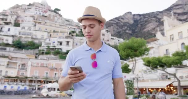 Male Model Looking at Smartphone at Trip in Italy Happiness Sunny Vacation Yachting Slow Motion Shot Red Epic 8k — Stock Video