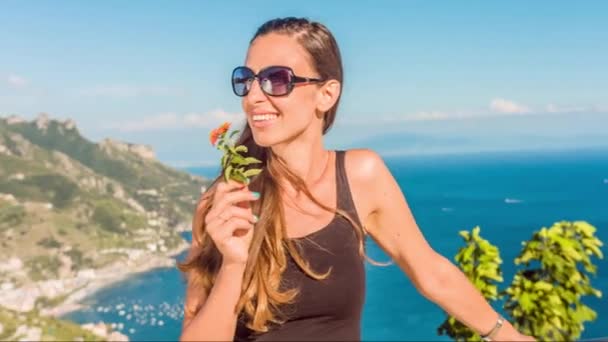 Pretty Young Tourist Travel Woman Smiling Enjoying Scenery Beach Joy Happiness Flower Smell Summer Holiday Getaway Ocean View Relaxation Outdoors Uhd — Stock Video