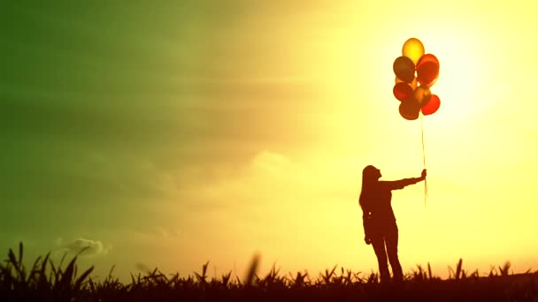 Woman with Balloons standing Meadow — Stock Video