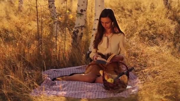 Young Female Student Reading Book — Stock Video