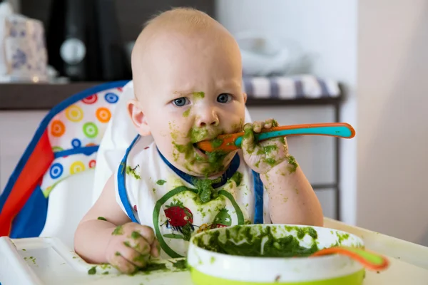 Feeding. Baby's first solid food