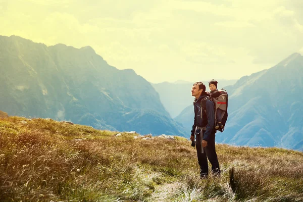 Family on a trekking day in the mountains. Mangart, Julian Alps, National Park, Slovenia, Europe. — Stock Photo, Image